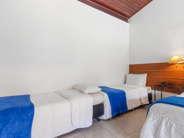 Hotel Ilha Branca Inn : photo 2 de la chambre chambre quadruple