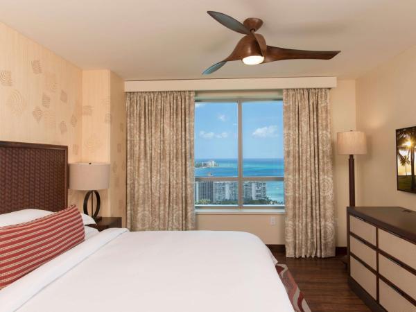 Hilton Grand Vacation Club The Grand Islander Waikiki Honolulu : photo 1 de la chambre suite 1 chambre lit king-size de luxe avec canapé-lit