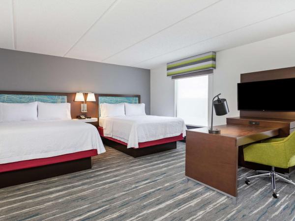 Hampton Inn & Suites Orlando International Drive North : photo 1 de la chambre studio suite with two queen beds and sofa bed