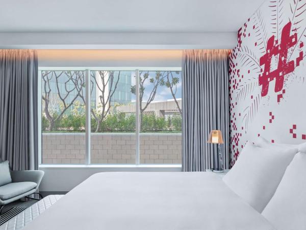 Radisson RED Dubai Silicon Oasis : photo 1 de la chambre chambre double ou lits jumeaux standard