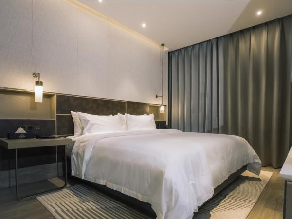 Orienwit Hotel-Free Shuttle Bus fir Canton Fair : photo 4 de la chambre chambre supérieure lit queen-size