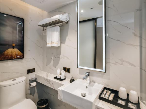 Orienwit Hotel-Free Shuttle Bus fir Canton Fair : photo 1 de la chambre chambre lits jumeaux deluxe