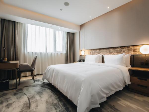 Orienwit Hotel-Free Shuttle Bus fir Canton Fair : photo 9 de la chambre chambre supérieure lit queen-size