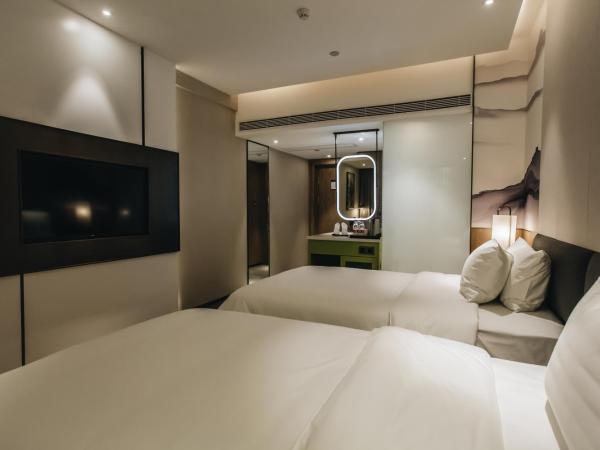 Orienwit Hotel-Free Shuttle Bus fir Canton Fair : photo 7 de la chambre chambre lits jumeaux deluxe