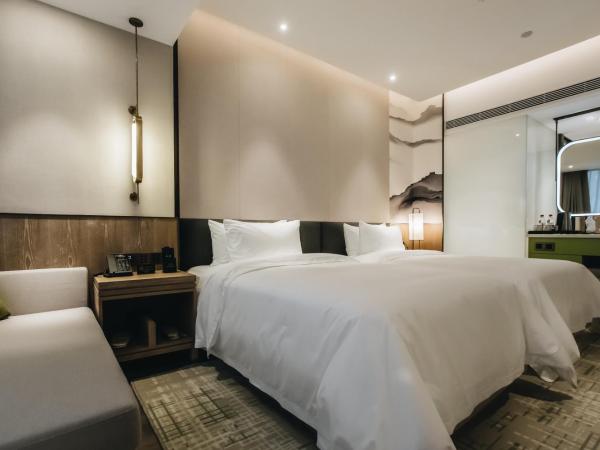 Orienwit Hotel-Free Shuttle Bus fir Canton Fair : photo 6 de la chambre chambre lits jumeaux supérieure