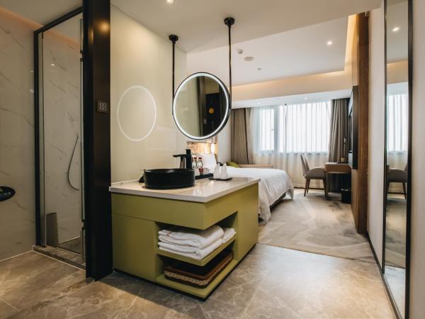 Orienwit Hotel-Free Shuttle Bus fir Canton Fair : photo 6 de la chambre chambre lit queen-size deluxe