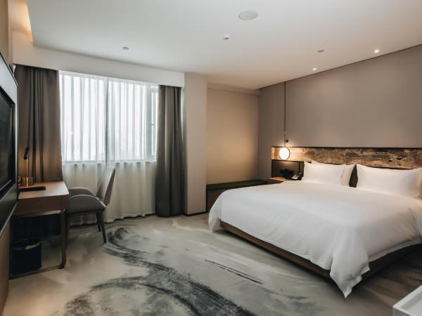 Orienwit Hotel-Free Shuttle Bus fir Canton Fair : photo 7 de la chambre chambre lit queen-size deluxe