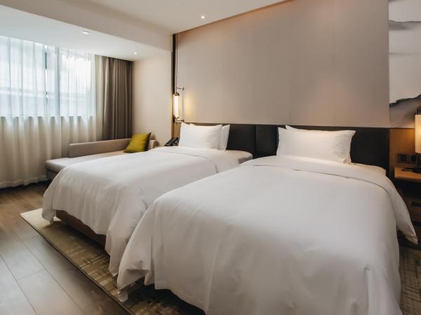 Orienwit Hotel-Free Shuttle Bus fir Canton Fair : photo 7 de la chambre chambre lits jumeaux supérieure