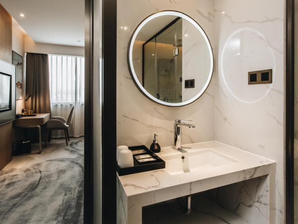 Orienwit Hotel-Free Shuttle Bus fir Canton Fair : photo 9 de la chambre chambre lit queen-size deluxe
