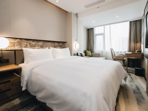 Orienwit Hotel-Free Shuttle Bus fir Canton Fair : photo 5 de la chambre chambre supérieure lit queen-size