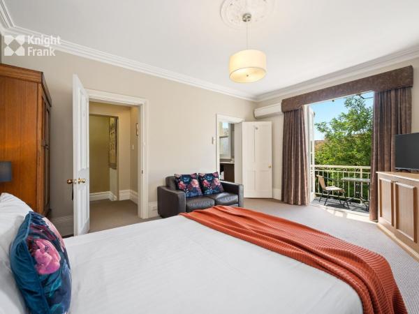 Clydesdale Manor : photo 1 de la chambre suite lit queen-size avec baignoire spa - 5