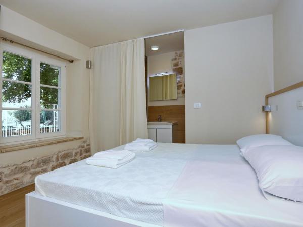 Idassa Palace rooms : photo 4 de la chambre chambre double - vue sur mer - bâtiment annexe