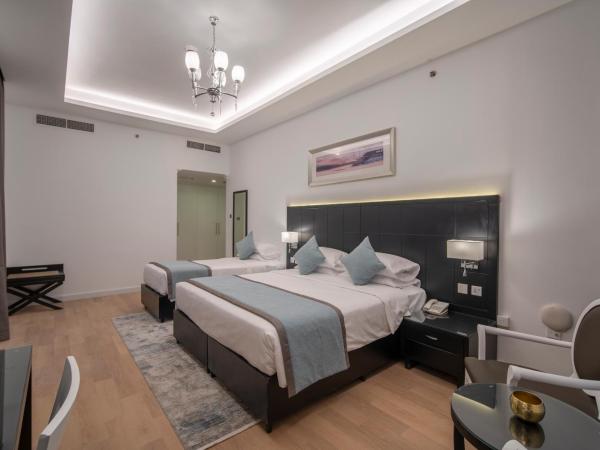 Rose Garden Hotel Apartments - Al Barsha, Near Metro Station : photo 1 de la chambre premium family two-bedroom apartment with balcony