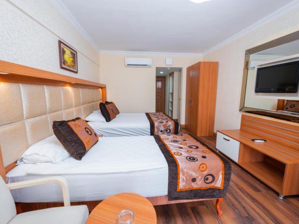Oz Hotels Incekum Beach : photo 1 de la chambre chambre familiale