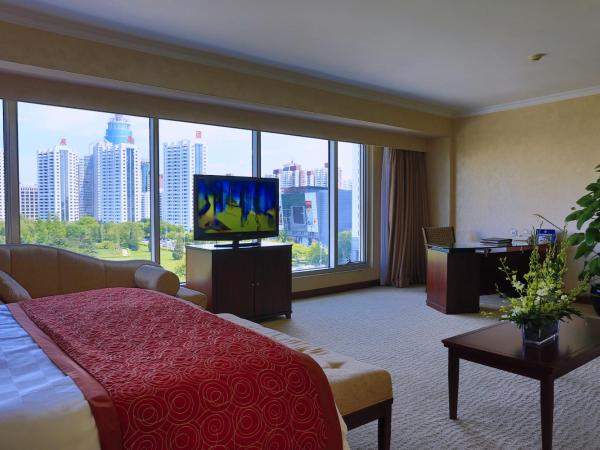 Beijing Continental Grand Hotel : photo 3 de la chambre chambre double deluxe - vue sur parc