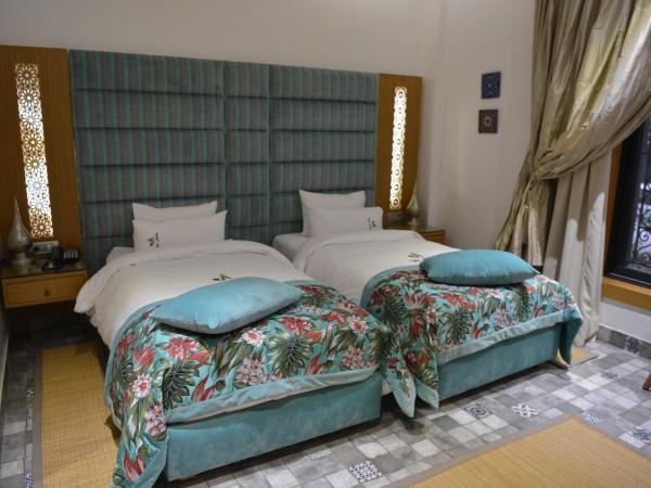 Aralia Boutique Hôtel : photo 2 de la chambre chambre lits jumeaux