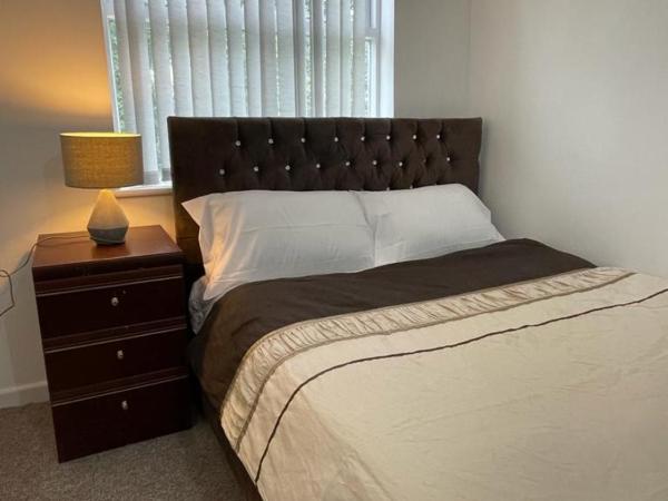 Bethel Apartments : photo 1 de la chambre chambre lit king-size