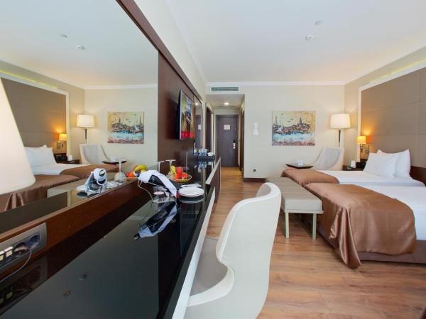 Ramada by Wyndham Istanbul Merter : photo 6 de la chambre chambre deluxe avec 3 lits jumeaux - non-fumeurs