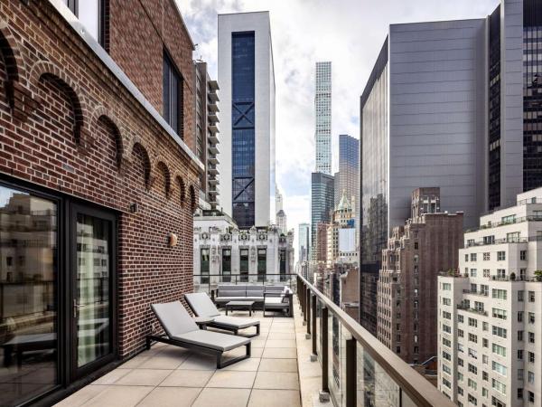 Hilton Club The Quin New York : photo 1 de la chambre suite penthouse 1 chambre lit king-size avec canapé-lit