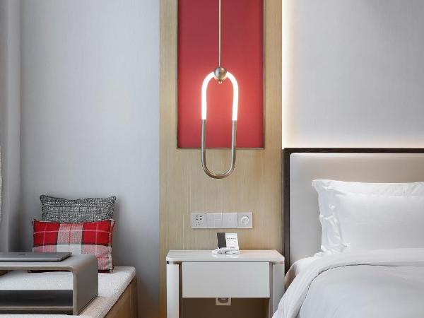 Qingdao Oriental Studio Chuangzhi SSAW Hotel : photo 1 de la chambre chambre double deluxe avec baignoire