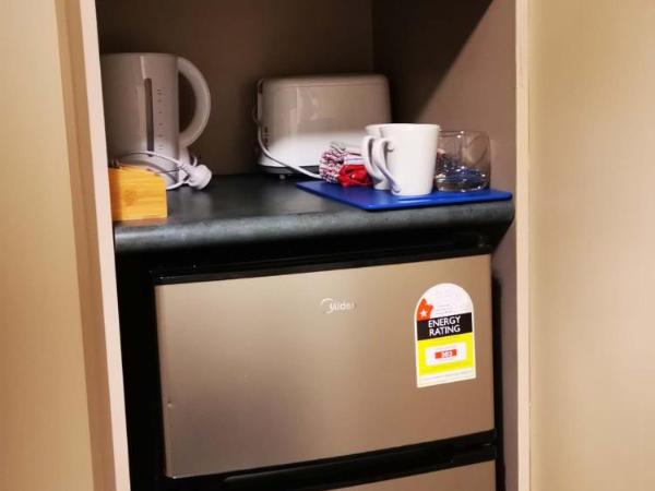 Stay Hostel Rotorua : photo 5 de la chambre chambre lits jumeaux avec salle de bains privative