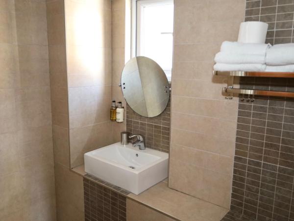 Brighton Inn Boutique Guest Accommodation : photo 1 de la chambre petite chambre double