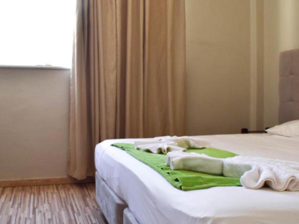 City Center Hotel : photo 2 de la chambre chambre lits jumeaux Économique