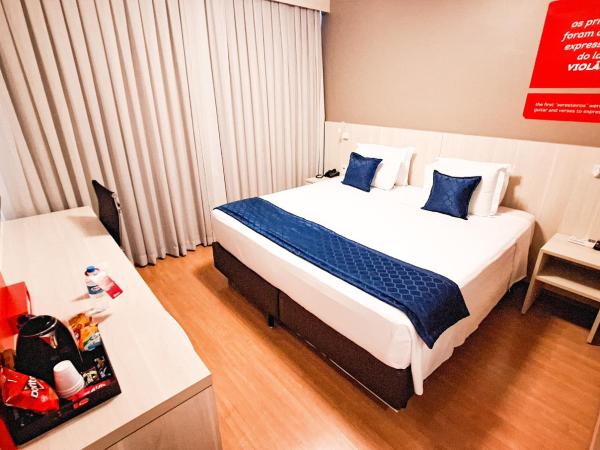 eSuites Belo Horizonte Minascasa : photo 1 de la chambre chambre lit queen-size deluxe