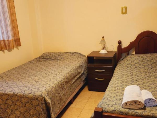 Brown Alojamientos Temporarios : photo 2 de la chambre chambre lits jumeaux