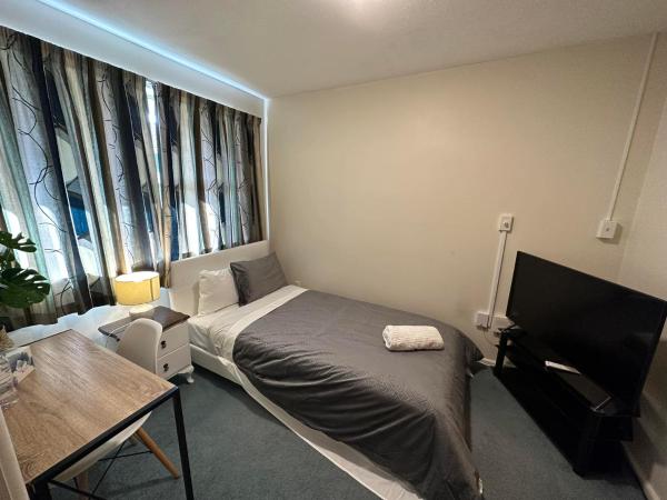 The Airport Homestay House : photo 1 de la chambre chambre simple avec toilettes et douche communes