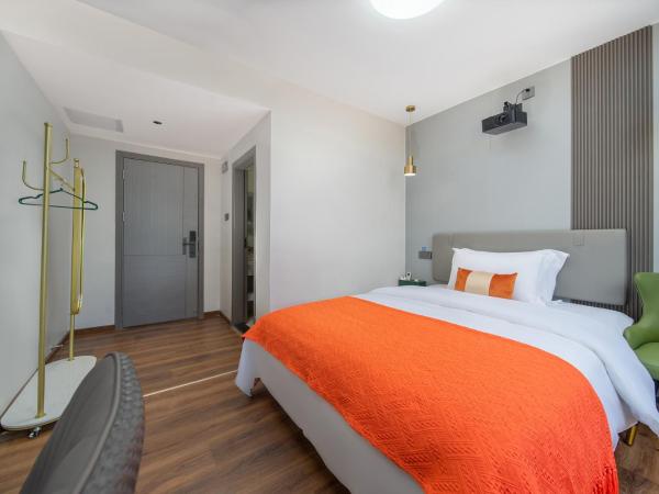 Guangzhou Yashay International Apartment - Pazhou Convention and Exhibition Centre : photo 2 de la chambre chambre lit queen-size deluxe