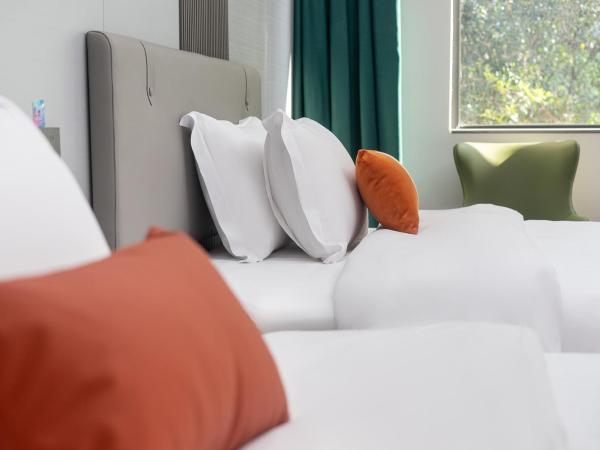 Guangzhou Yashay International Apartment - Pazhou Convention and Exhibition Centre : photo 5 de la chambre chambre lits jumeaux supérieure