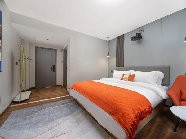 Guangzhou Yashay International Apartment - Pazhou Convention and Exhibition Centre : photo 6 de la chambre chambre lit king-size deluxe