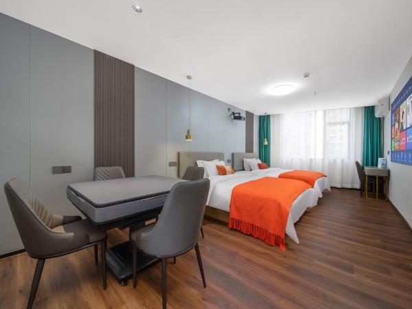 Guangzhou Yashay International Apartment - Pazhou Convention and Exhibition Centre : photo 1 de la chambre chambre deluxe avec 2 lits doubles