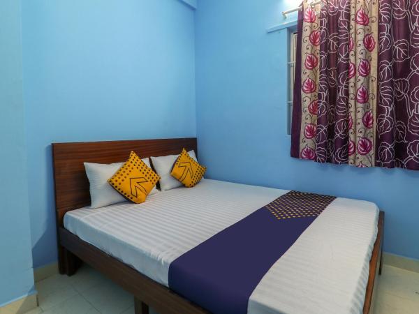 SPOT ON 61234 Pradeep Stays : photo 10 de la chambre chambre triple avec salle de bains