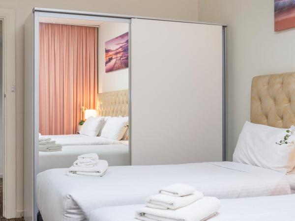 Adelaide Granada Motor Inn : photo 3 de la chambre appartement