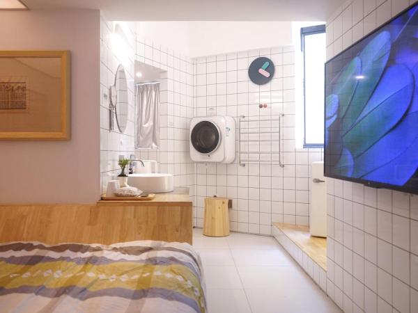 TGS Studio Hotel : photo 1 de la chambre chambre triple