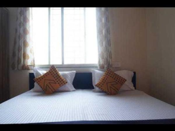 OYO Flagship Hotel Chalukya Executive : photo 6 de la chambre chambre triple classique