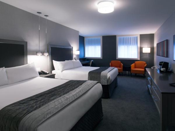 Hotel Manoir Victoria : photo 1 de la chambre chambre supérieure lit queen-size