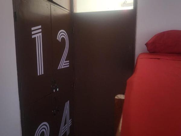 Pachá Hostel Backpack : photo 3 de la chambre chambre quadruple Économique