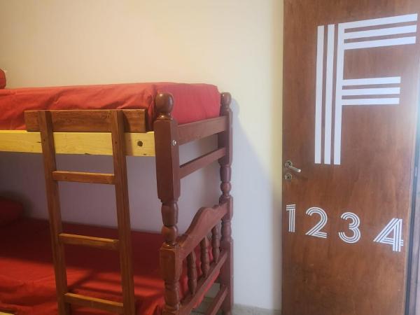 Pachá Hostel Backpack : photo 4 de la chambre chambre quadruple Économique