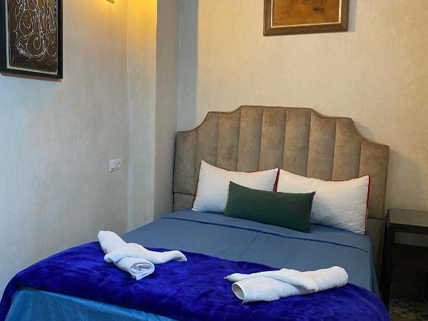 RIAD Tamazouzt : photo 2 de la chambre chambre double avec salle de bains privative