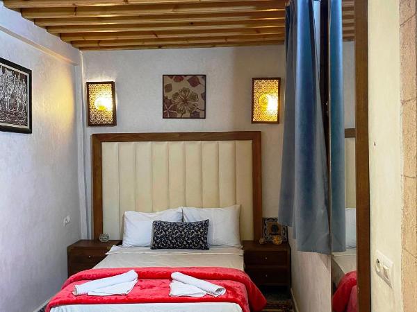 RIAD Tamazouzt : photo 9 de la chambre chambre double avec salle de bains privative