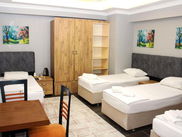 biglife hotel : photo 4 de la chambre chambre quadruple avec salle de bains commune