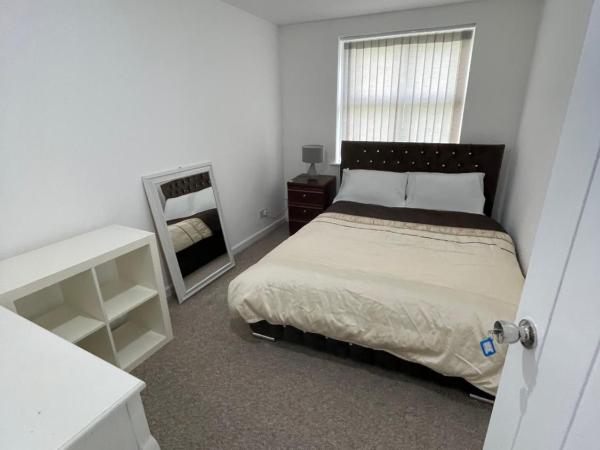 Bethel Apartments : photo 4 de la chambre chambre lit king-size