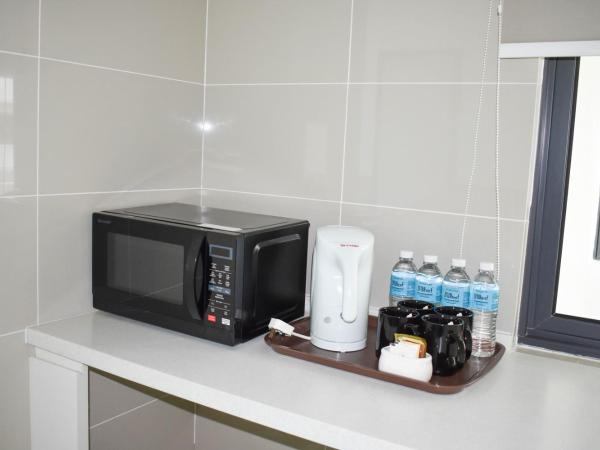 D'Wharf Hotel & Serviced Residence : photo 9 de la chambre suite familiale