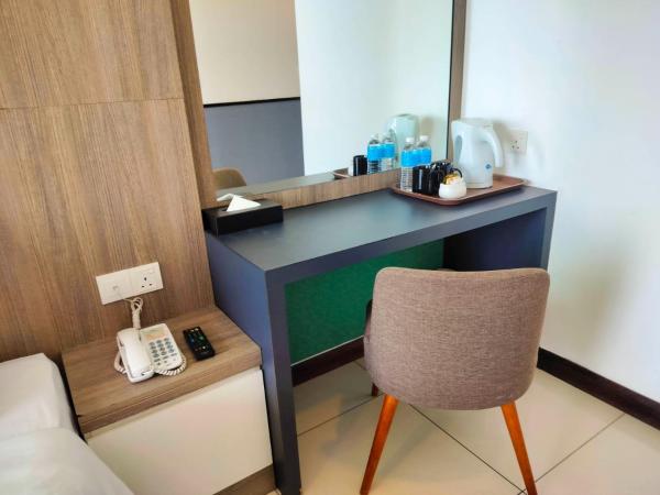 D'Wharf Hotel & Serviced Residence : photo 4 de la chambre chambre lits jumeaux supérieure