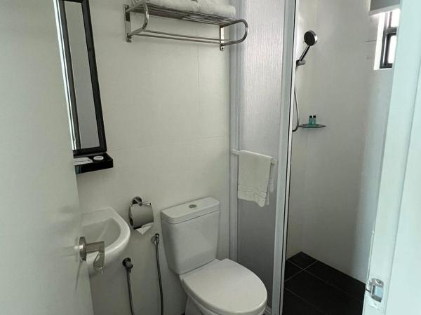D'Wharf Hotel & Serviced Residence : photo 7 de la chambre chambre lits jumeaux supérieure