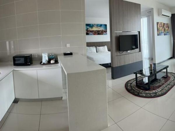 D'Wharf Hotel & Serviced Residence : photo 6 de la chambre suite exécutive - vue sur ville 