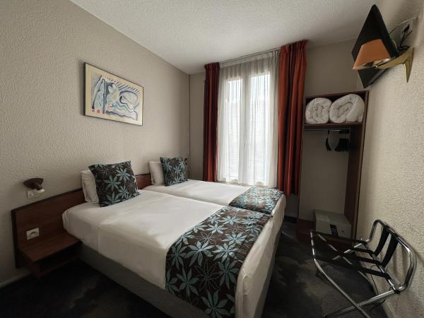 Timhotel Boulogne Rives de Seine : photo 3 de la chambre chambre lits jumeaux